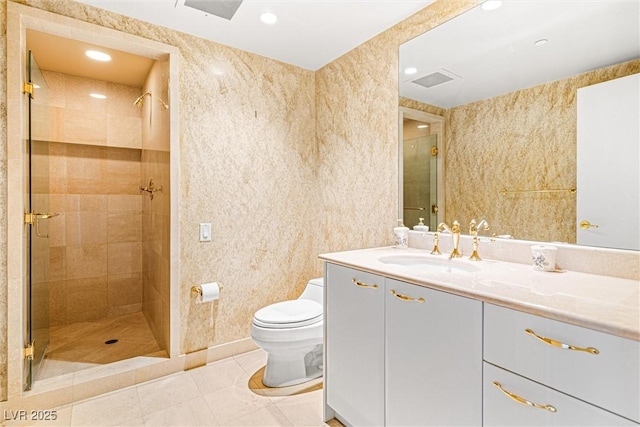 2877 Paradise Rd Unit 702, Las Vegas, NV 89109 - bathroom with vanity, a shower stall, tile patterned flooring, and recessed lighting
