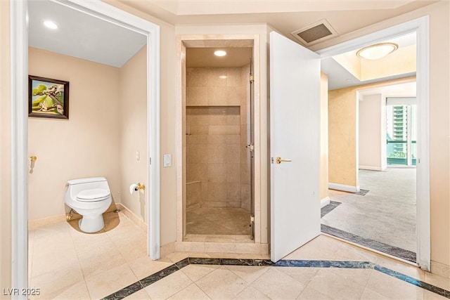 2877 Paradise Rd Unit 702, Las Vegas, NV 89109 - bathroom with inlaid floor details, a stall shower, and recessed lighting