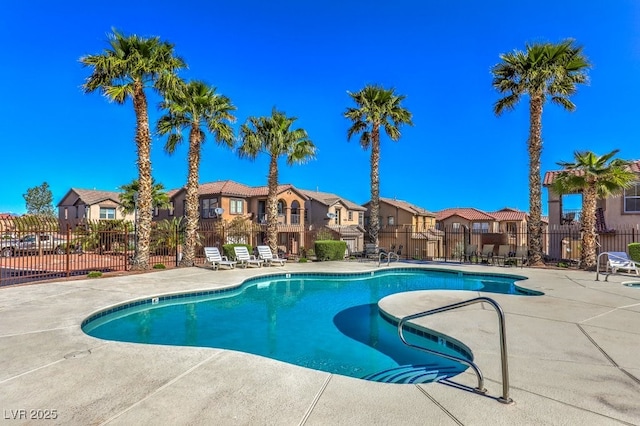 1097 Paradise Resort Dr, Henderson, NV 89002 - community pool featuring a residential view and a patio area