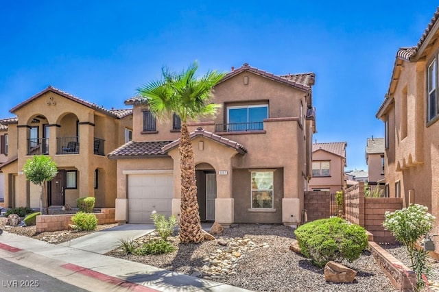 1097 Paradise Resort Dr, Henderson, NV 89002 - mediterranean / spanish-style home featuring a tiled roof, stucco siding, driveway, a balcony, and an attached garage
