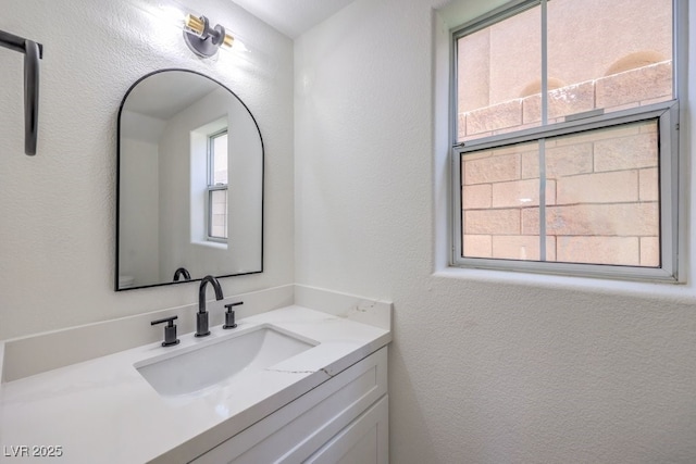 1097 Paradise Resort Dr, Henderson, NV 89002 - bathroom featuring vanity and a textured wall