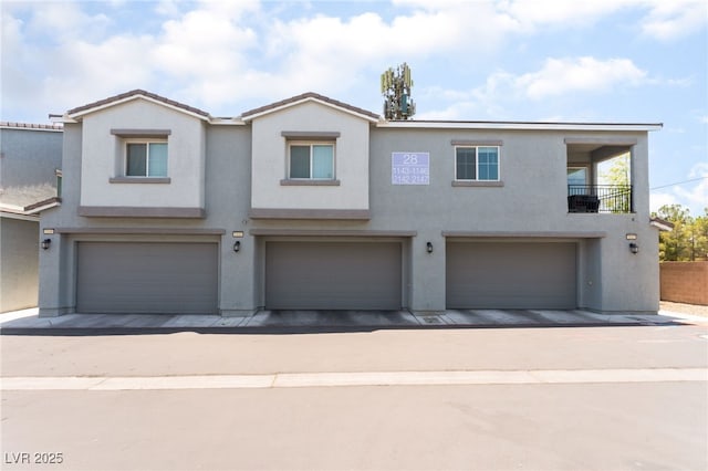 2861 Sunflower Days Ave Unit 1144, North Las Vegas, NV 89031 - multi unit property with a garage and stucco siding