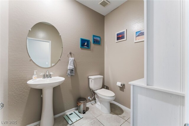 2861 Sunflower Days Ave Unit 1144, North Las Vegas, NV 89031 - bathroom featuring toilet and tile patterned floors