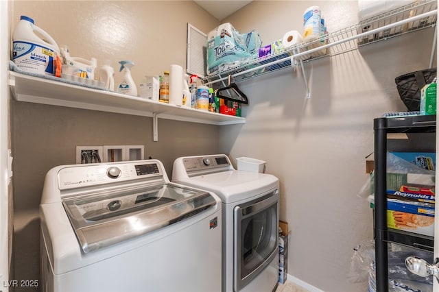2861 Sunflower Days Ave Unit 1144, North Las Vegas, NV 89031 - washroom with washer and clothes dryer and baseboards