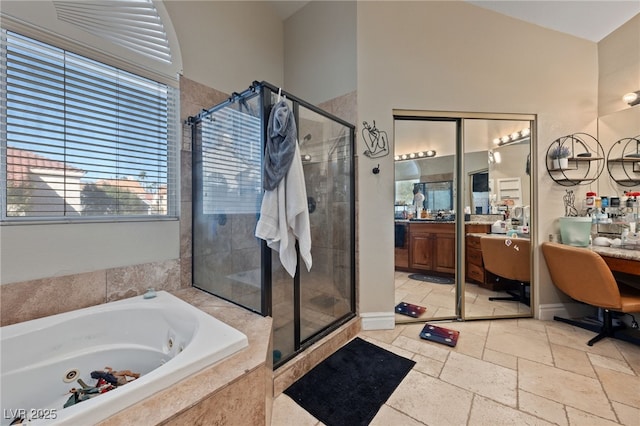 2637 Ohio Ct, Las Vegas, NV 89128 - full bathroom featuring a shower stall, a whirlpool tub, and plenty of natural light