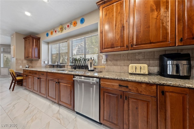 2637 Ohio Ct, Las Vegas, NV 89128 - kitchen featuring dishwasher, light marble finish flooring, tasteful backsplash, light stone countertops, and brown cabinetry