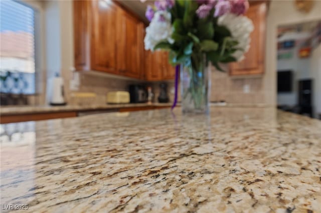2637 Ohio Ct, Las Vegas, NV 89128 - kitchen view of brown cabinets and light stone countertops
