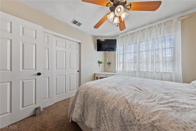 2637 Ohio Ct, Las Vegas, NV 89128 - carpeted bedroom featuring a closet and a ceiling fan