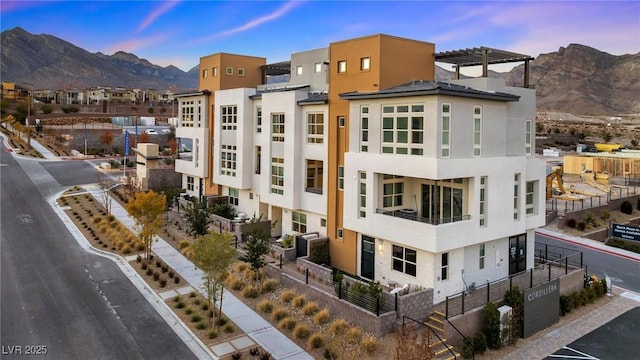 650 Agate Bridge St, Las Vegas, NV 89138 - property at dusk with a mountain view