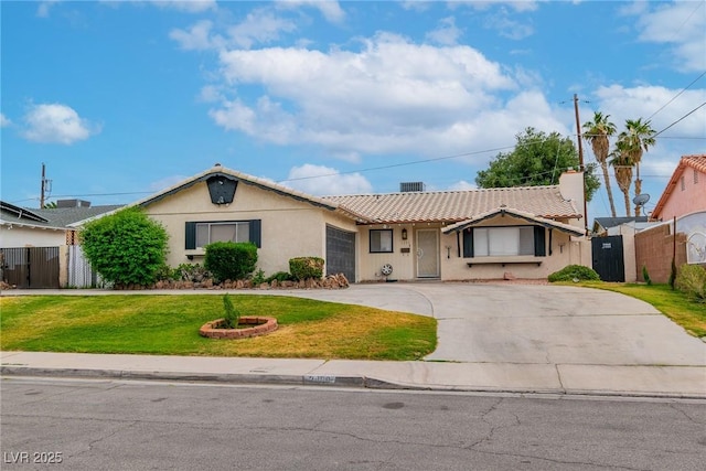 3499 Middlebury Ave, Las Vegas, NV 89121 - single story home with stucco siding, concrete driveway, an attached garage, and a tiled roof