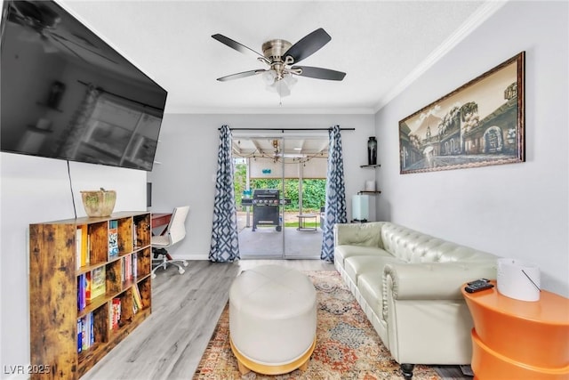 3499 Middlebury Ave, Las Vegas, NV 89121 - living room with crown molding, a ceiling fan, and wood finished floors