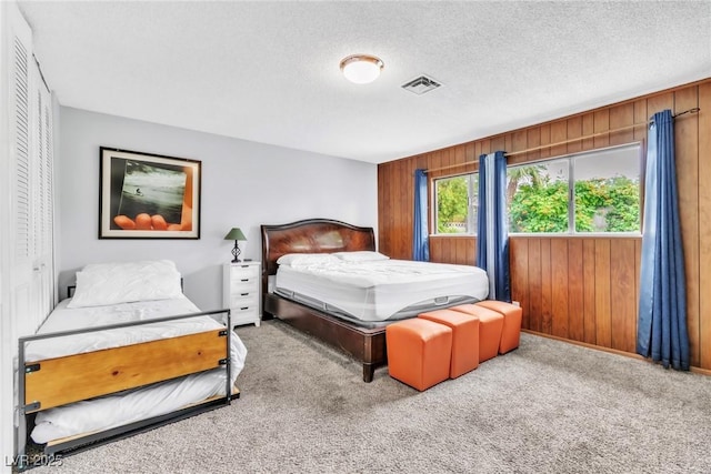 3499 Middlebury Ave, Las Vegas, NV 89121 - carpeted bedroom featuring wooden walls and baseboards