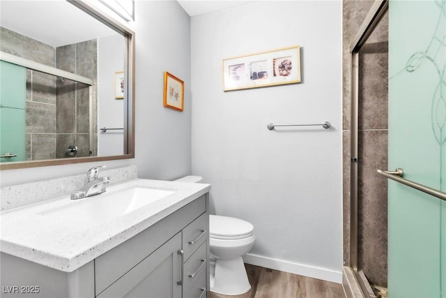 3499 Middlebury Ave, Las Vegas, NV 89121 - full bathroom featuring vanity, wood finished floors, and a shower stall