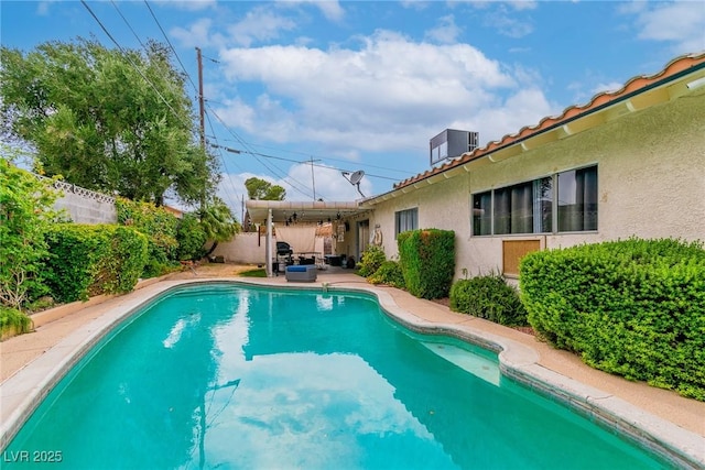 3499 Middlebury Ave, Las Vegas, NV 89121 - view of swimming pool with a fenced backyard and a patio