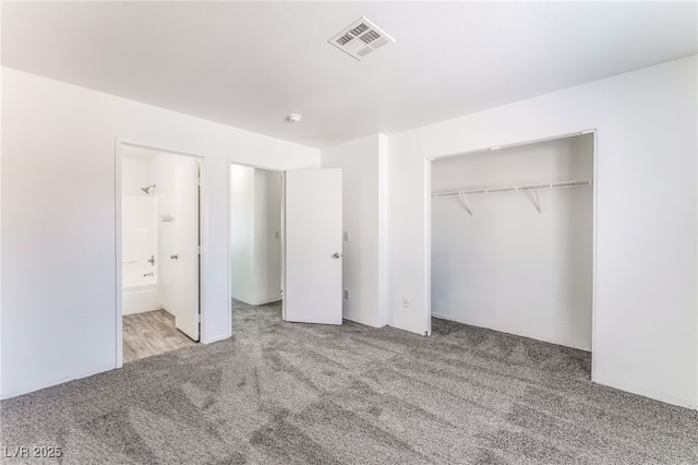 2149 Clancy St, Las Vegas, NV 89156 - unfurnished bedroom with carpet flooring, a closet, and connected bathroom