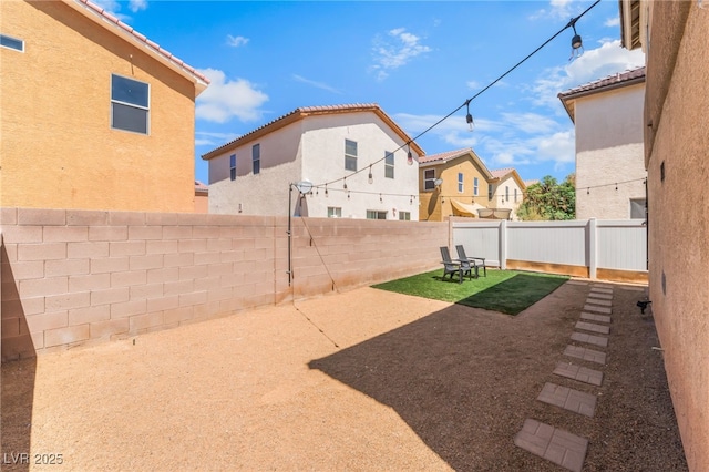 2149 Clancy St, Las Vegas, NV 89156 - fenced backyard featuring a patio area and a residential view