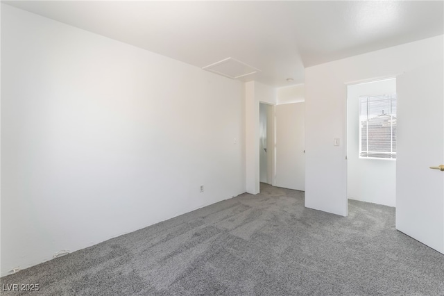 2149 Clancy St, Las Vegas, NV 89156 - carpeted empty room featuring attic access