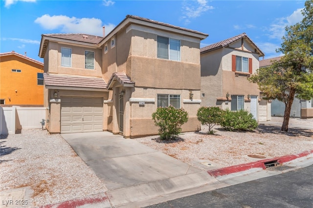 2149 Clancy St, Las Vegas, NV 89156 - view of front facade with stucco siding, a tile roof, a garage, and driveway