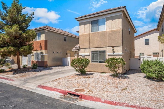 2149 Clancy St, Las Vegas, NV 89156 - view of front of house featuring stucco siding and a gate