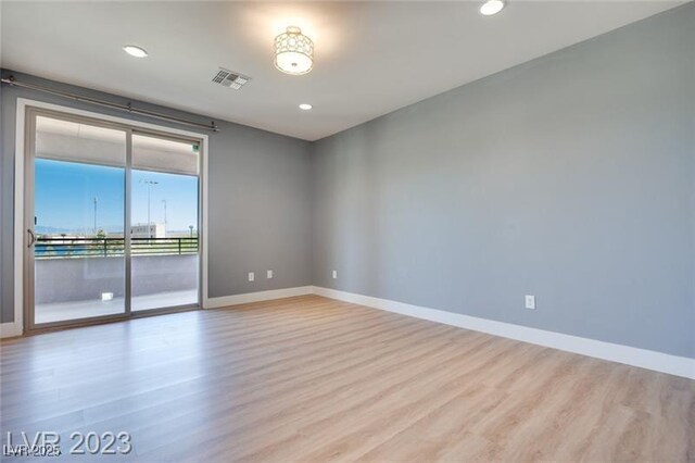 10342 Kesington Dr, Las Vegas, NV 89135 - unfurnished room with wood finished floors and recessed lighting