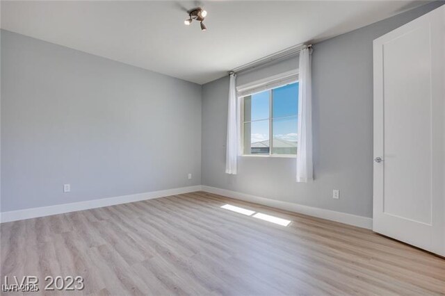 10342 Kesington Dr, Las Vegas, NV 89135 - spare room with light wood-style flooring