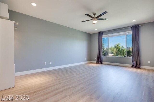 10342 Kesington Dr, Las Vegas, NV 89135 - empty room featuring light wood-style flooring, ceiling fan, and recessed lighting