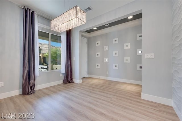10342 Kesington Dr, Las Vegas, NV 89135 - spare room with a chandelier, light wood-type flooring, and recessed lighting