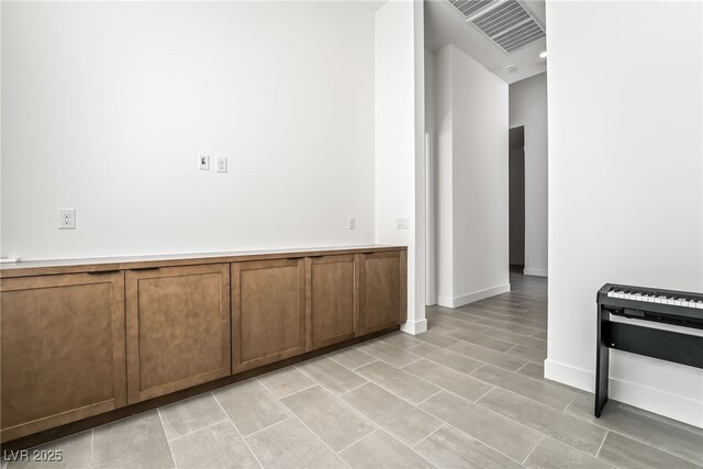 10919 Vista Altura Ave, Las Vegas, NV 89135 - kitchen with brown cabinets and light countertops