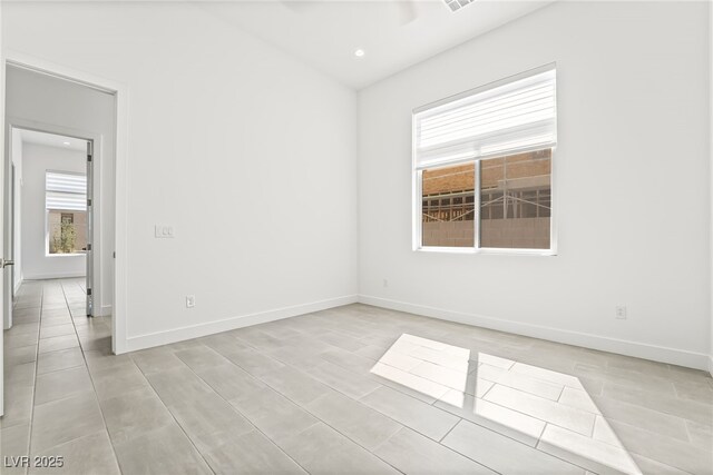 10919 Vista Altura Ave, Las Vegas, NV 89135 - spare room featuring recessed lighting and light tile patterned floors