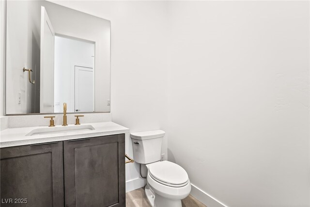 10919 Vista Altura Ave, Las Vegas, NV 89135 - bathroom featuring baseboards and vanity