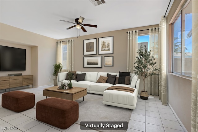 9451 Natoma Station Pl, Las Vegas, NV 89123 - living room with plenty of natural light, light tile patterned flooring, and ceiling fan