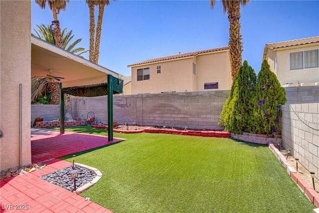 9451 Natoma Station Pl, Las Vegas, NV 89123 - fenced backyard featuring ceiling fan and a patio area
