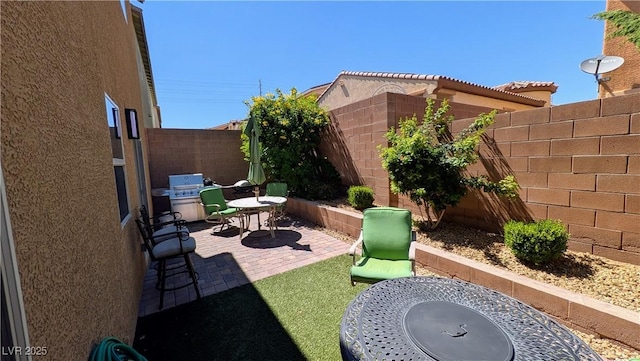 10668 Berkshire Woods Ave, Las Vegas, NV 89166 - fenced backyard with a patio