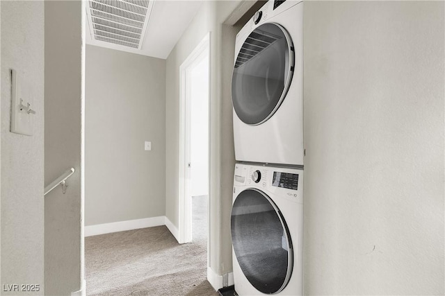 5200 Paradise Skies Ave, Las Vegas, NV 89156 - laundry room with stacked washer / drying machine and carpet