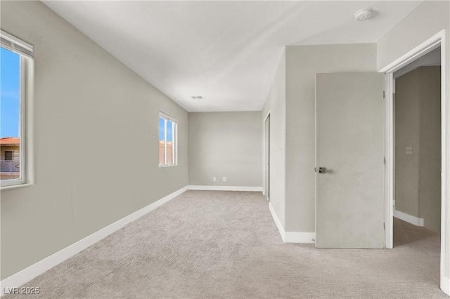5200 Paradise Skies Ave, Las Vegas, NV 89156 - carpeted empty room featuring a smoke detector and baseboards