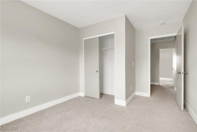 5200 Paradise Skies Ave, Las Vegas, NV 89156 - unfurnished bedroom featuring light colored carpet and a closet