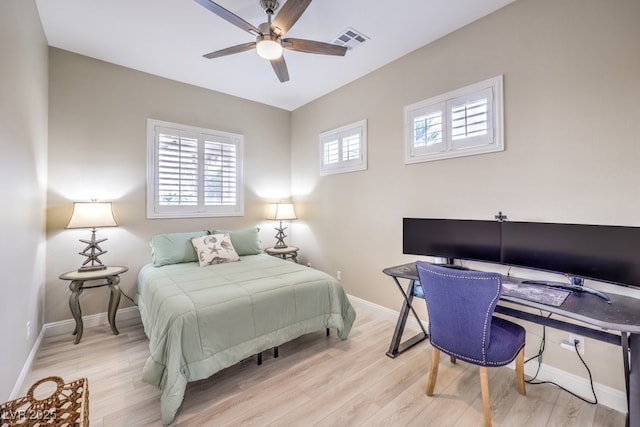 2156 Farmington Bay Ct, Henderson, NV 89044 - bedroom featuring an office area, light wood-style flooring, and ceiling fan