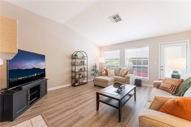 4909 Desert Poppy Dr, Las Vegas, NV 89130 - living room with lofted ceiling and light wood-type flooring