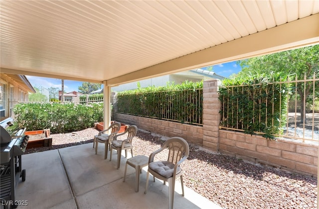 4909 Desert Poppy Dr, Las Vegas, NV 89130 - fenced backyard with a patio