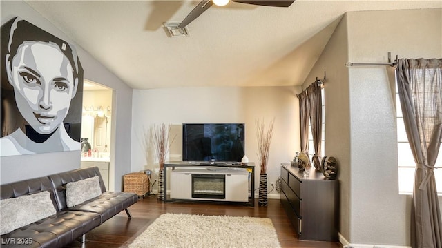 7329 Restful Springs Ct, Las Vegas, NV 89128 - living area with vaulted ceiling, a ceiling fan, and dark wood finished floors