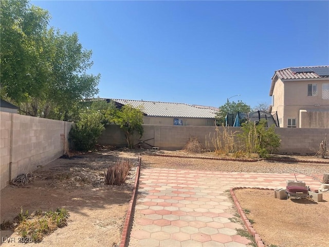 1278 N Sloan Ln, Las Vegas, NV 89110 - fenced backyard featuring a patio area