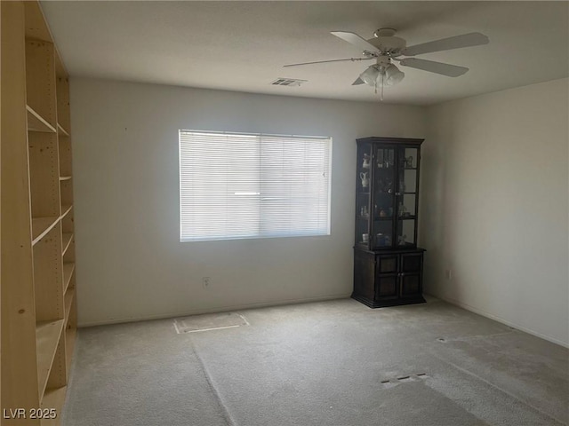 1278 N Sloan Ln, Las Vegas, NV 89110 - unfurnished room with carpet flooring and a ceiling fan