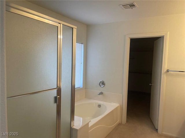 1278 N Sloan Ln, Las Vegas, NV 89110 - bathroom with a garden tub and a stall shower