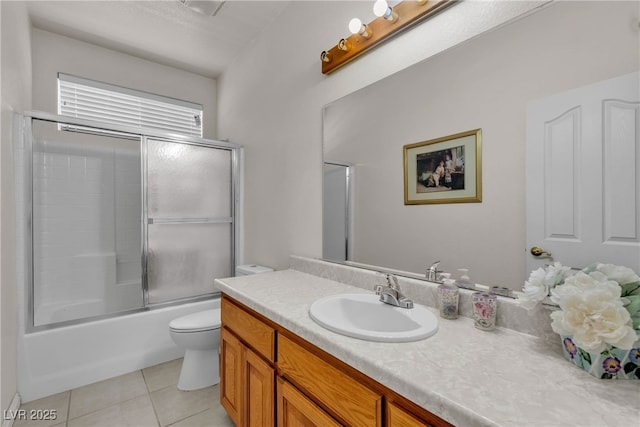 825 W Ryan Ave, Overton, NV 89040 - full bathroom with vanity, tile patterned flooring, and shower / bath combination with glass door