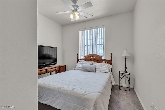 825 W Ryan Ave, Overton, NV 89040 - carpeted bedroom with baseboards and ceiling fan