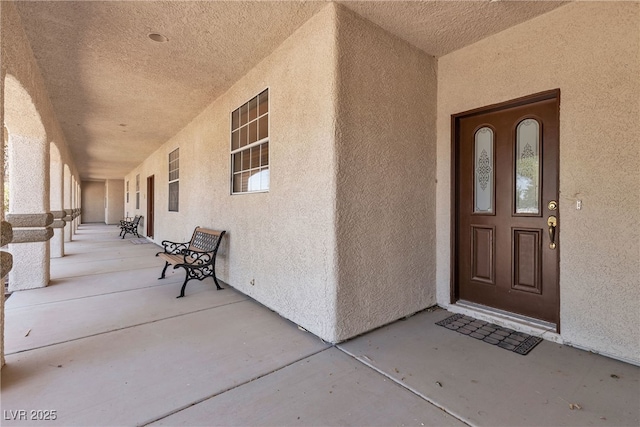 825 W Ryan Ave, Overton, NV 89040 - view of exterior entry featuring stucco siding and a porch