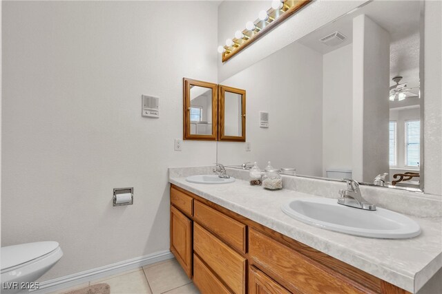 825 W Ryan Ave, Overton, NV 89040 - full bathroom with double vanity, a ceiling fan, and tile patterned floors