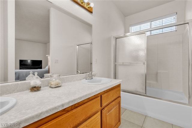 825 W Ryan Ave, Overton, NV 89040 - full bath featuring ensuite bath, double vanity, tile patterned flooring, and bath / shower combo with glass door