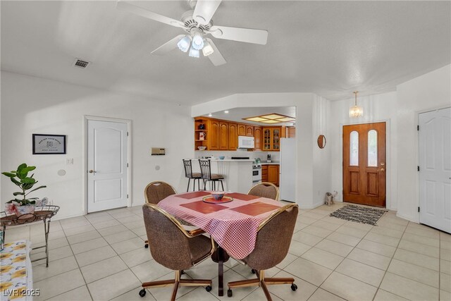 825 W Ryan Ave, Overton, NV 89040 - dining area with light tile patterned flooring and a ceiling fan