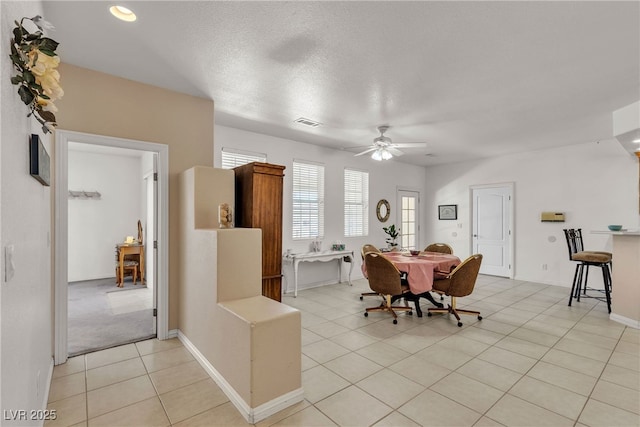825 W Ryan Ave, Overton, NV 89040 - dining space with light tile patterned floors and ceiling fan